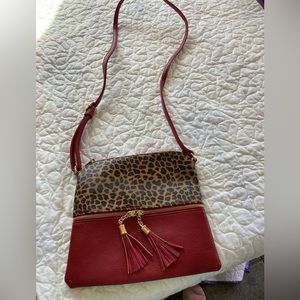 Crossbody Bag  red and cheetah “leather “ look. Purchased at a boutique.
